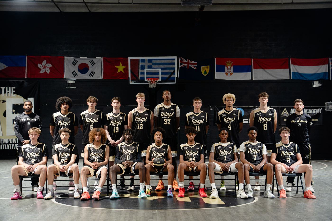 ADAPT Global 2025 team in black Wooter uniforms